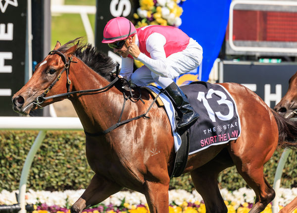 Skirt The Lay claims the Magic Millions 2yo Classic much to the delight of Ryan Maloney (image Grant Courtney)