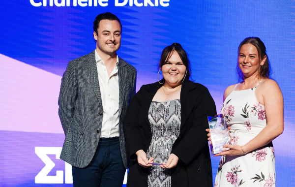 Anna Baigent (middle) with Entain's Andrew Hannan and Claire Downey, representative for fellow category winner Chanelle Dickie.  Photo: Supplied