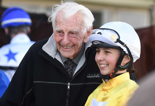 Trainer Brian Marriott, 94, pictured with jockey Temyia Taiaroa following Bellissimo's win at Wanganui on Saturday. Photo: Peter Rubery (Race Images Palmerston North)