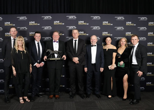 CAPTION: Co-breeder and part-owner David Price with the Horse of the Year trophy.