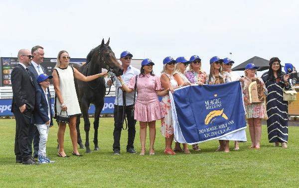 Invincible Woman and her happy connections - image Brett Holburt / Racing Photos