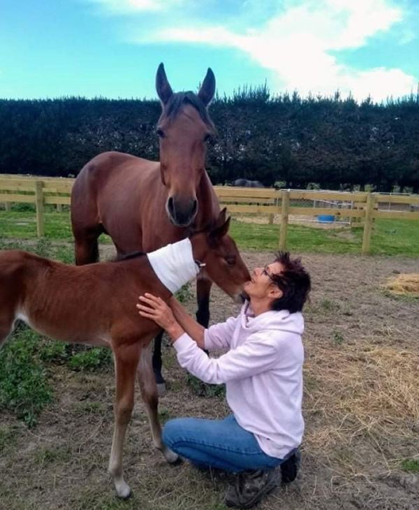 Kaye Sanders with mare and foal.