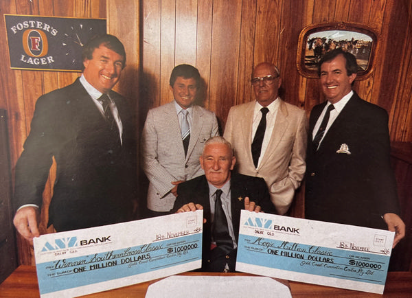 Carl Waugh (front) with his investors Merrell Kruger and Gordon MacNicol, with race cheques for the inaugural 1987 Magic Million 2YO Classic and its sister event, the Magic Million Southern Cross Classic. (Image supplied)