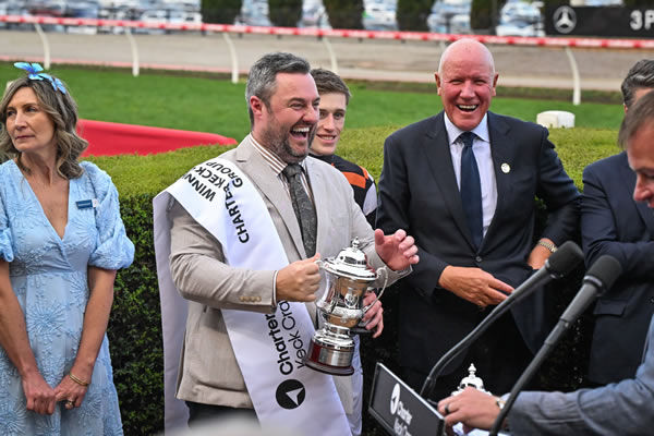 Some days are diamonds - Nathan Bennett accepts the trophy at Moonee Valley - image Reg Ryan / Racing Photos 