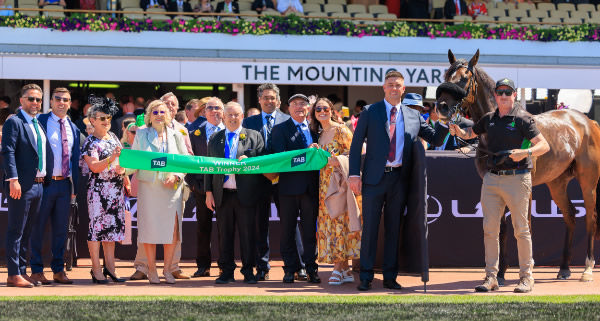 Opening Address and his owners celebrate - image Grant Courtney