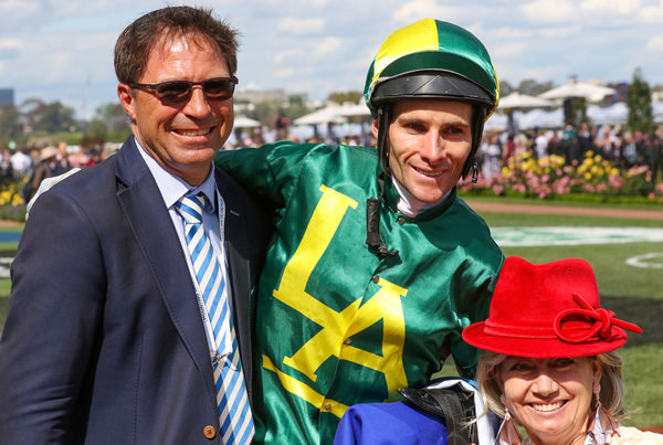 Sam Williams and Catriona Williams pictured with jockey Jamie Mott Photo: Bruno Canatelli 