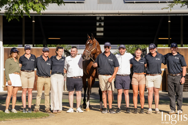 Hunter's Lodge team celebrate their success with the $900,000 Toronado (IRE) colt.