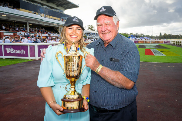 Marge Ojapold and Graham White all smiles with the Railway Stakes Trophy - image Western RAcepix