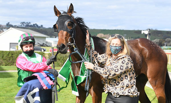 Trainer Chrissy Bambry and jockey Sarah McNab celebrate their success with Bellacontte in the Listed O’Learys Filles Stakes (1200m) at Wanganui on Saturday. Photo: Grant Matthew (Race Images Palmerston North)