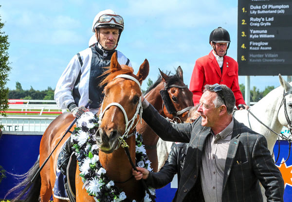 Owner-trainer Sabin Kirkland welcomes back a victorious Buoyant and jockey Michael McNab after the Gr.3 Stewards Stakes (1200m) at Riccarton on Monday. Photo: Race Images South