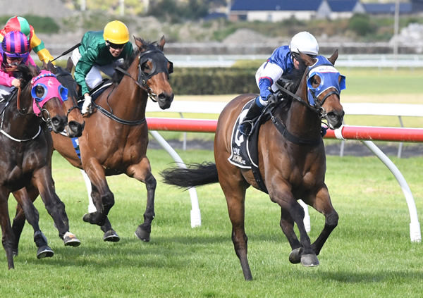 Tina Comignaghi guides classy mare Diss Is Dramatic (inside) to victory in the Gr.3 Gee & Hickton Funeral Directors Thompson Handicap (1600m). Photo: Peter Rubery (Race Images Palmerston North)