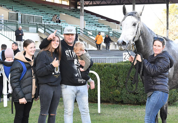 Co-trainer and part-owner Nigel Elliot pictured with his family after El Nymph’s victory at Te Rapa earlier this month. Photo: Race Images