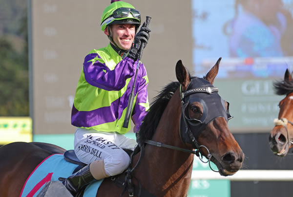 Chris Dell salutes on Hi Yo Sass Bomb after winning Sunday's Gr.3 Gee And Hickton Funeral Directors Thompson Handicap (1600m) at Trentham.  Photo: Peter Rubery (Race Images Palmerston North)
