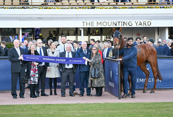 Jimmy the Bear and his super happy owners - image Reg Ryan / Racing Photos