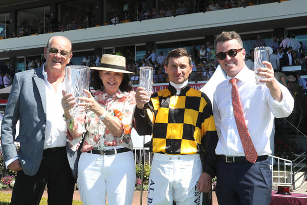 L-R: Brendan and Jo Lindsay celebrate the victory of Kahma Lass with rider Opie Bosson and trainer Jamie Richards Photo Credit: Race Images South