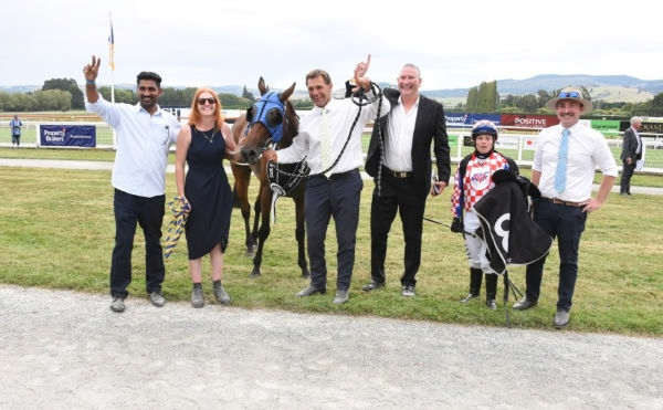 Loftys Gift winning the Listed Positive Signs + Print Dunedin Gold Cup (2400m) at Wingatui on Saturday. Photo: Tayler Stong