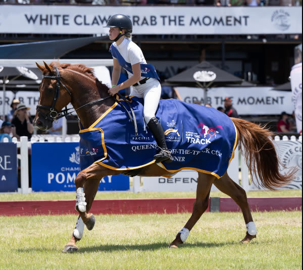 Makaylah Fenwick and Rainbow Man win the 2025 MM Off the Track Cup - image Magic Millions 