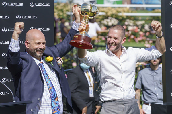 Ozzie Kheir (left) pictured with co-owner Brae Sokolski following Verry Elleegant's Gr.1 Melbourne Cup (3200m) victory.  Photo: Racing Photos