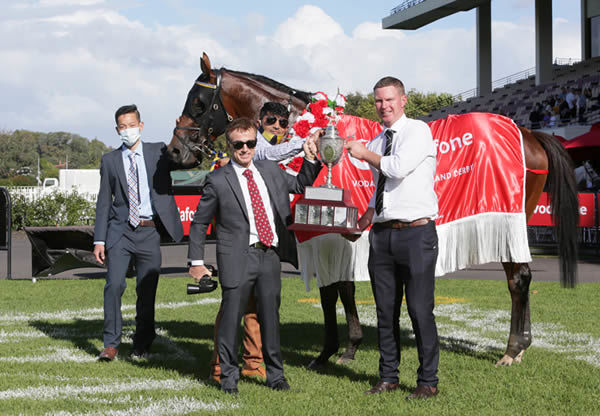Trainers Lance O’Sullivan (left) and Andrew Scott pose with the Gr.1 Vodafone New Zealand Derby trophy Photo: Trish Dunell
