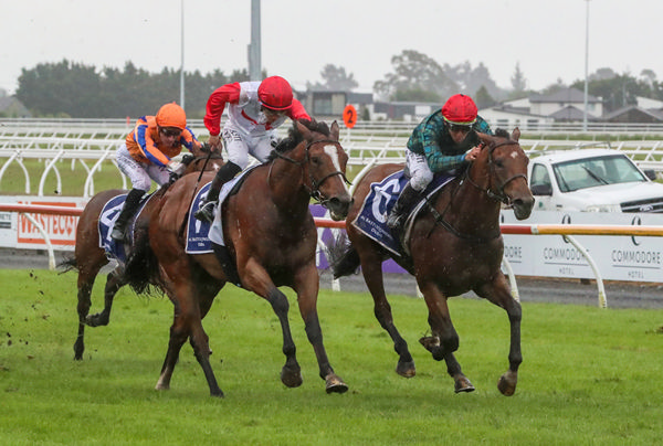 Stablemates Romanoff (inside) and Affirmative Action fight out a desperate finish to the Gr.1 Al Basti Equiworld Dubai New Zealand 2000 Guineas. Photo: Race Images South