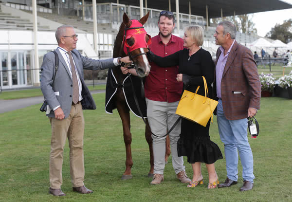 Co-trainer Roger James (left) with Cherry and Brent Taylor after the win by Two Illicit Photo Credit: Trish Dunell