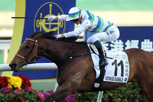 Voyage Bubble and Jamie Kah win the Classic Mile - image HKJC