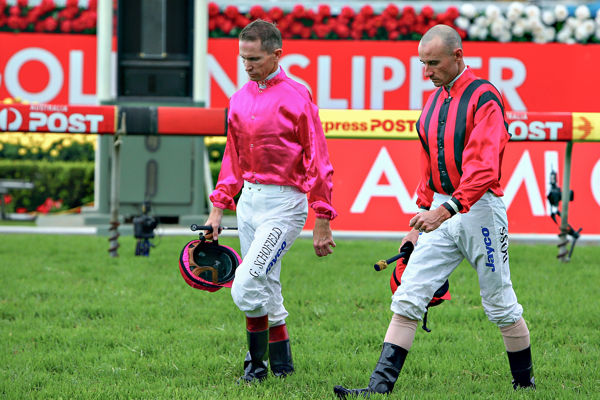The face of Glen boss says it all as he and Glyn Schofield trudge back after the scratching of their mounts before the 2011 Golden Slipper (Mark Smith)