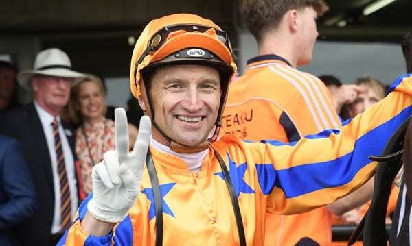 Opie Bosson after gaining a 2000th New Zealand victory aboard Move To Strike. Photo: Kenton Wright (Race Images)