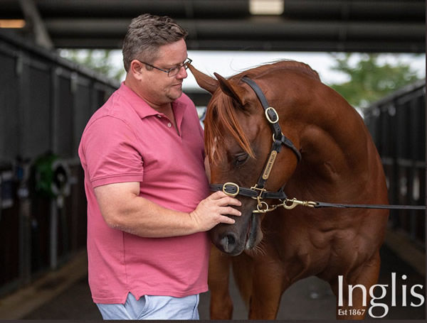 Record breaking $625,000 Capitalist colt and his breeder Richard McLenahan - image Inglis. 